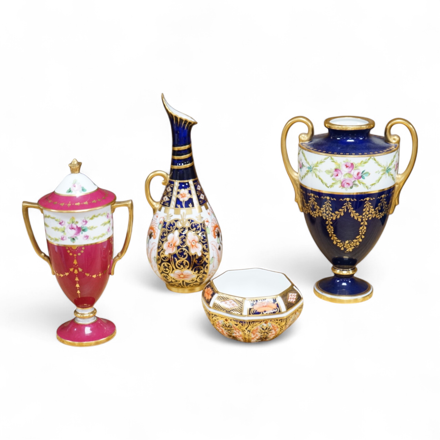 A Royal Crown Derby Imari miniature bowl and similar ewer, together with two Minton two handled vases, one with a cover, 18cm